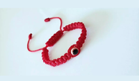 Pulcera roja con ojo