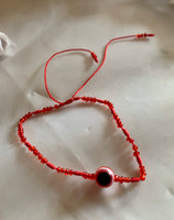 Pulcera roja con ojo extra delgada.