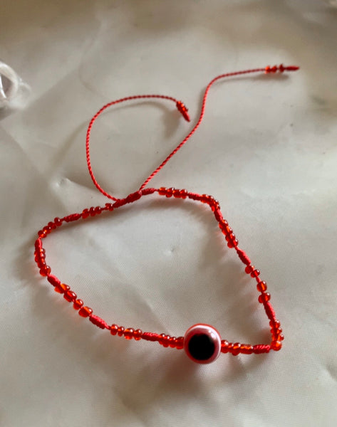 Pulcera roja con ojo extra delgada.